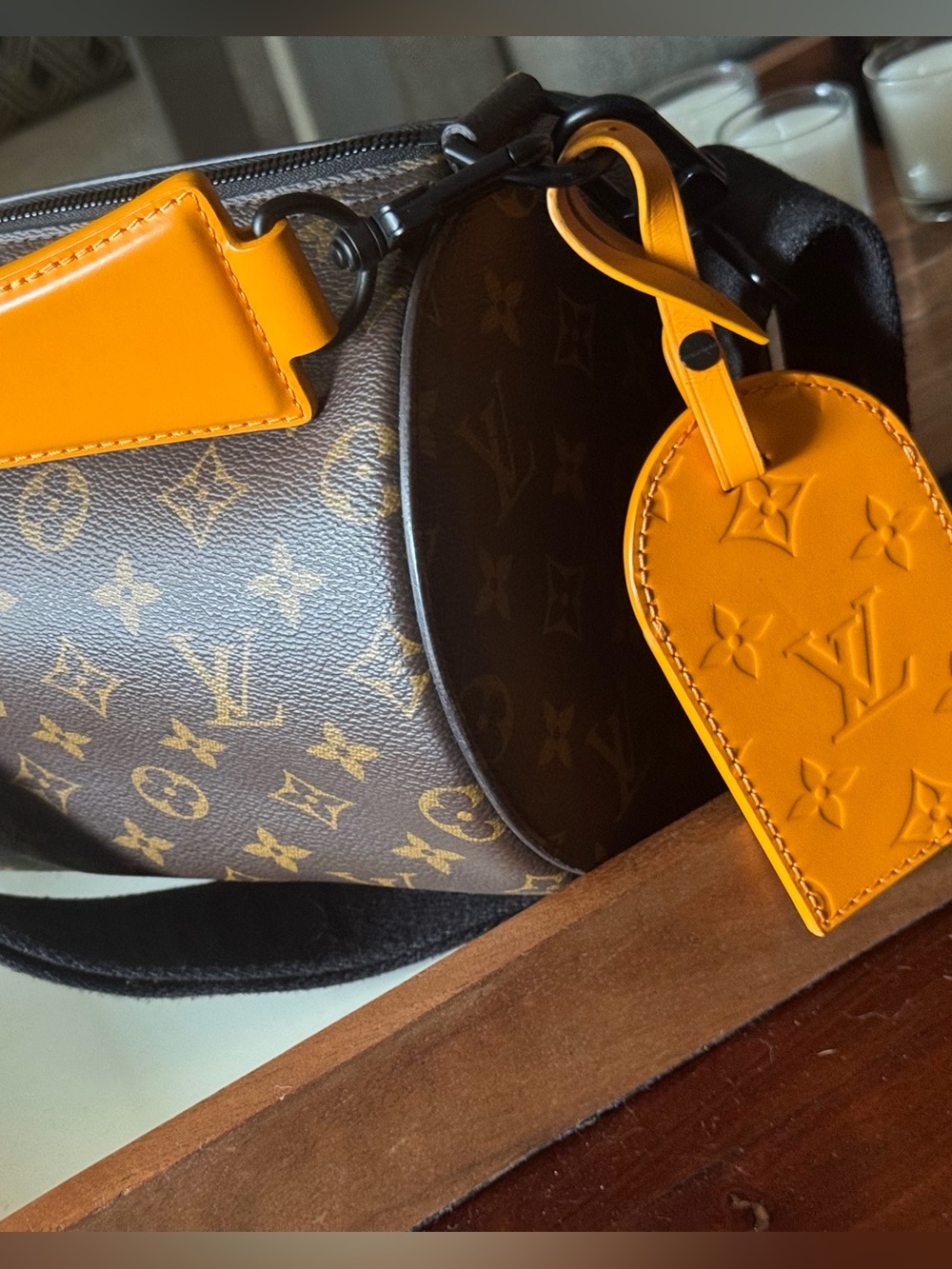 AUTHENTIC LOUIS VUITTON - Soft Polochon in Monogram Canvas with Saffron accents